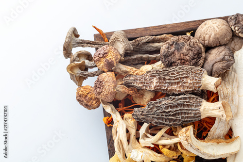 Assorted Dried Mushrooms in Wooden Tray