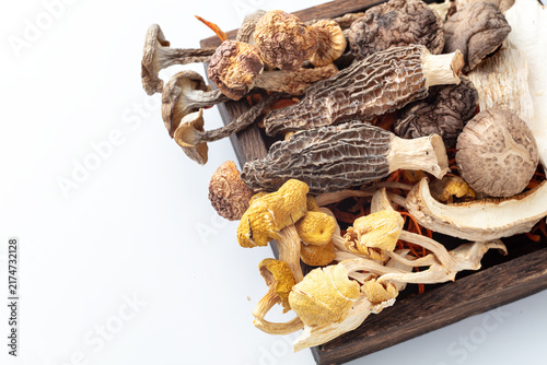 Assorted Dried Mushrooms in Wooden Tray