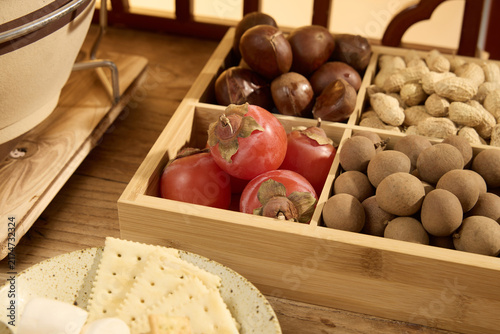 Assorted Nuts and Dried Fruit in Wooden Tray