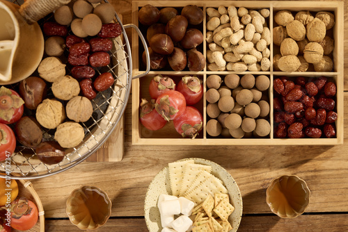 Assorted Nuts and Dried Fruits on Wooden Table