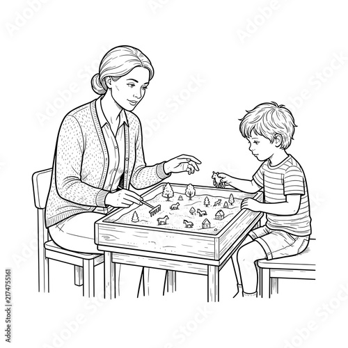 Therapist guiding child through sand tray session for neurodiversity therapy occupational health blog and website