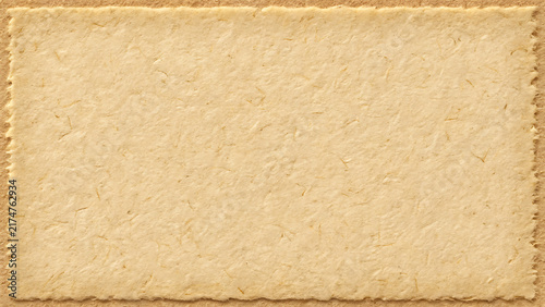 Old vintage handmade paper texture background with rough deckle edges