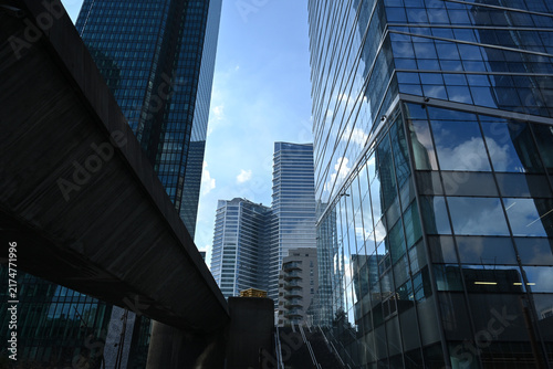 Modern architecture of futuristic skyscrapers in La Défense, Paris.