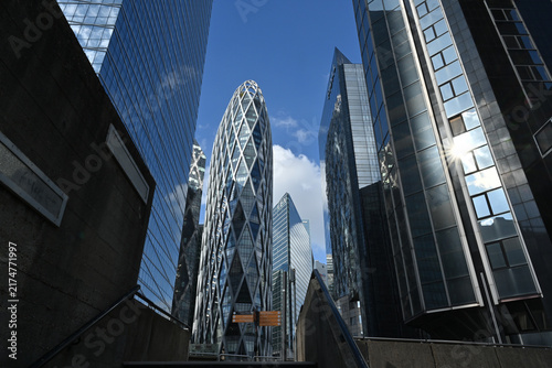Diamond‑pattern tower and contemporary glass buildings in La Défense District, Paris.