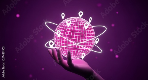 Human hand holding a glowing digital globe with location pins and orbital data rings.