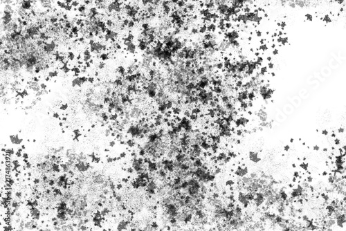 Grungy black ink splatter texture on white background. Distressed spray paint effect. Abstract monochrome grain for vintage design overlays.