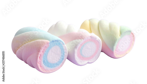 Three colorful twisted treats with vibrant hues of pink, blue, yellow, and white against a stark black background