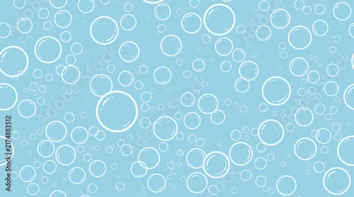 Seamless pattern with white soap bubbles on a blue background