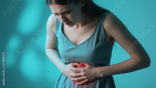 Pelvic pain stomachache concept. Hands of young woman on stomach as suffer on menstruation cramp, indigestion,gastrointestinal,diarrhea problem