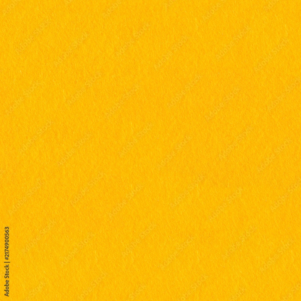 Fototapeta premium Bright yellow felt fabric texture as a seamless square background