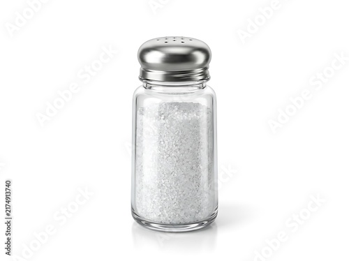 Close-up studio shot of a transparent glass salt shaker filled with white granulated salt and a metallic lid against a white background