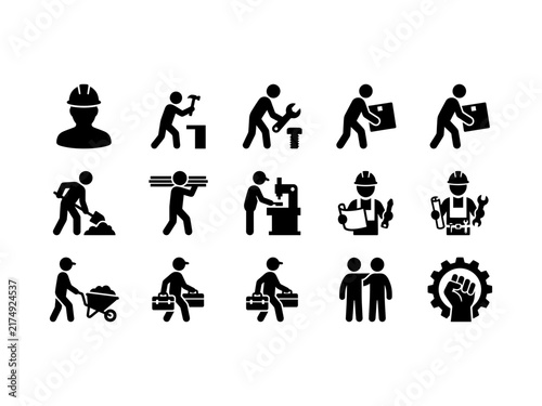 Silhouettes of construction workers and tools for industry and labor concepts.
