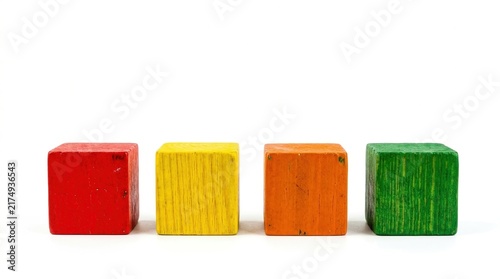 Four painted wooden blocks, creative metaphor, problem solving, challenge and abstract concept.