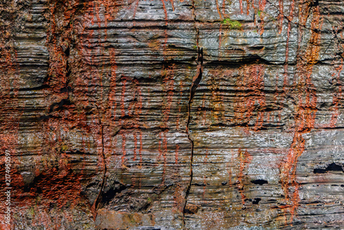 Принти на полотні Lava forms knotted basalt with rusty highlights inside Raufarholshellir, Iceland