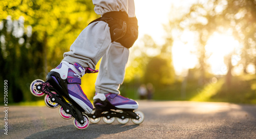 Obraz na płótnie Child Rollerblading At Sunset