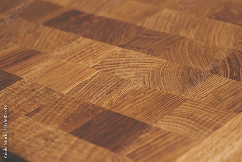 End grain oak wood texture background with natural brown timber pattern and rustic detail.