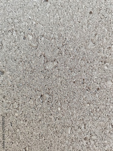 Photography Beige concrete block surface with coarse granular texture close up