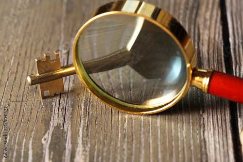 Magnifying Glass And Key
