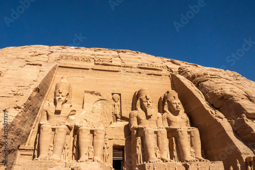 Fotografie Giant, carved figures carved into the stone around the entrance to the temple of