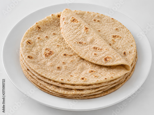 Fresh Chapati Flatbreads Stacked on White Plate
