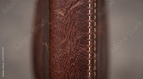 Obraz na plátně Extreme close-up of premium dark brown leather texture with detailed grain and s