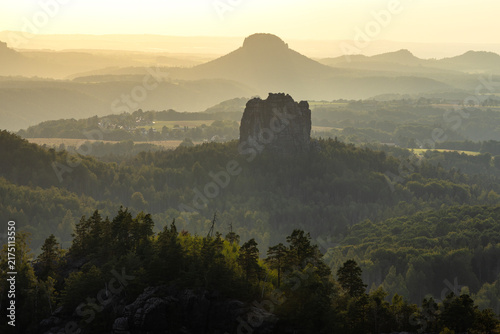 Fotografie Panoramic sunset view of Falkenstein rock formation and Lilienstein in Saxon Swi