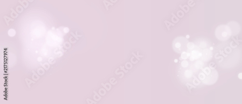 Foto Bokeh background Soft white light orbs on a pale pink surface with glow