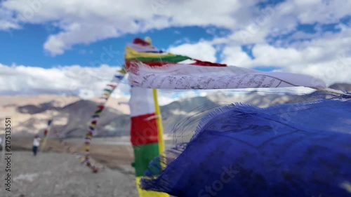 buddhist colourful tibtan praying flags waving in the wind in the Himalaya