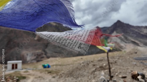 buddhist colourful tibtan praying flags waving in the wind in the Himalaya