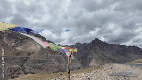buddhist colourful tibtan praying flags waving in the wind in the Himalaya