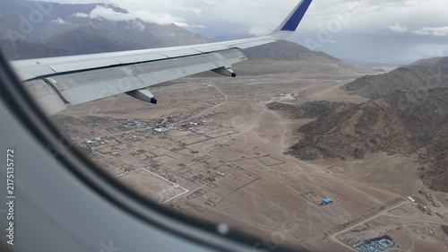 The Himalayan mountains seen from the plane window in Ladakh  India