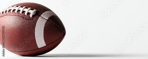 American football football ball sport equipment brown leather white stripe closeup minimalist copy space horizontal background clean American football football ball sport equipment brown leather