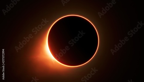 A dramatic solar eclipse showing a glowing ring of fire against deep black space
