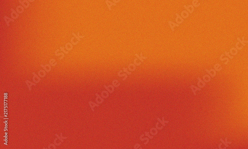 Abstract grainy gradient background, with warm blended, tones of deep, red and bright, vibrant orange