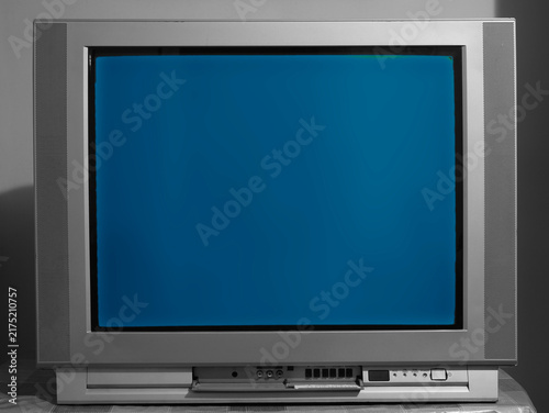 Old retro aged historical tube tv television light blue chroma key screen vintage screen no signal isolated on black dark background backdrop Empty template blank Mock up mockup mock-up