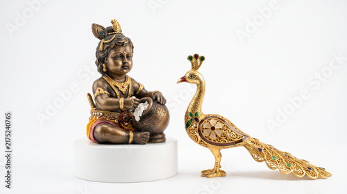 Baby Krishna Statue with Peacock for Janmashtami Celebration