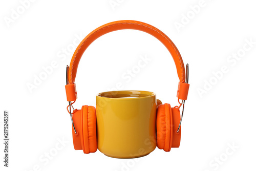 Konstfotografi A cup of coffee or tea with headphones isolated on white background