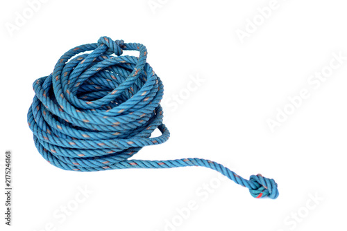 Cuadro en lienzo coiled blue rope with stopper knot isolated on white background.
