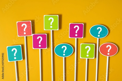 Question mark signs representing choice and uncertainty