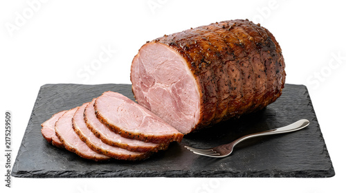 Canvastavla Delicious sliced smoked ham on slate board with serving fork transparent backgro