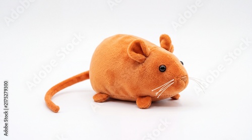 Cute small orange plush mouse toy captured from a side profile angle placed on white background