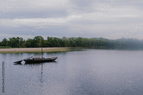 Traditional boat in the mist