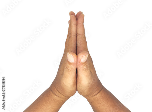Two hands joined together in praying gesture. Close-up of hands for namaste greeting, prayer, faith, and spirituality.