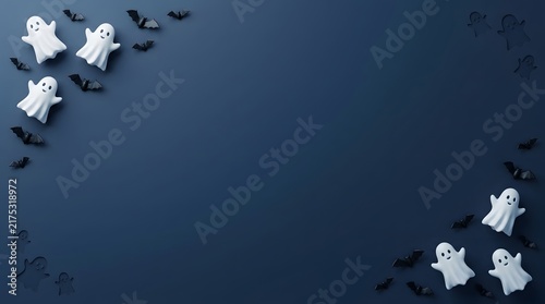 Halloween background with cute ghosts and black bats on a dark blue surface