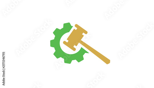 Green cogwheel combined with a gold gavel representing legal regulations, industrial law, or corporate justice.