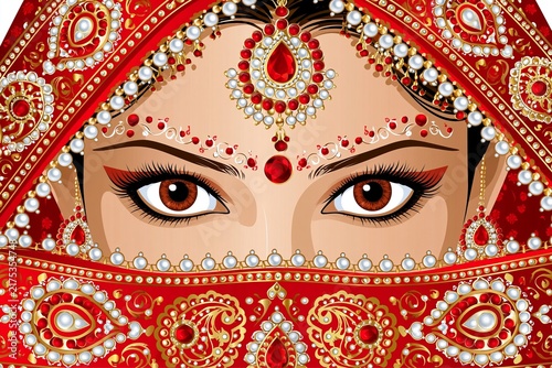 Beautiful woman wearing traditional red bridal attire with intricate gold jewelry and patterns