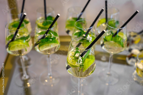 drinks to be Hugo Spritz cocktails, which typically consist of prosecco, elderflower liqueur, soda water, fresh mint, and lime.