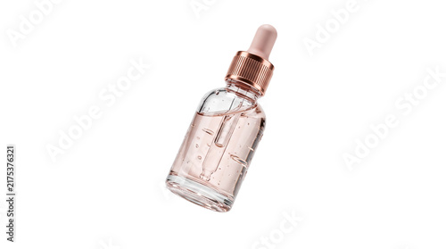 Luxury rose gold facial serum bottle, glass dropper vial with pink liquid, cosmetic skin care product for beauty branding isolated PNG with Transparent Background