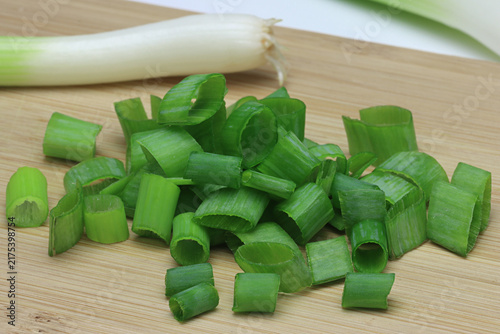 Quadro su tela Fresh Scallions assorted close up on white background