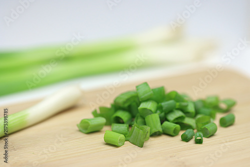 Quadro su tela Fresh Scallions assorted close up on white background